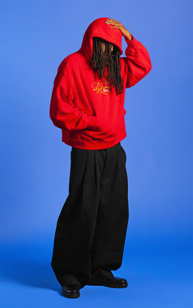 LaFrance Cropped Red Stampede Hoodie & Black Pleated Denim
